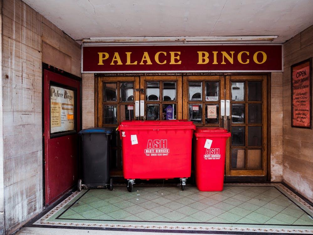Free Dumpsters in Front of Bingo Place Stock Photo